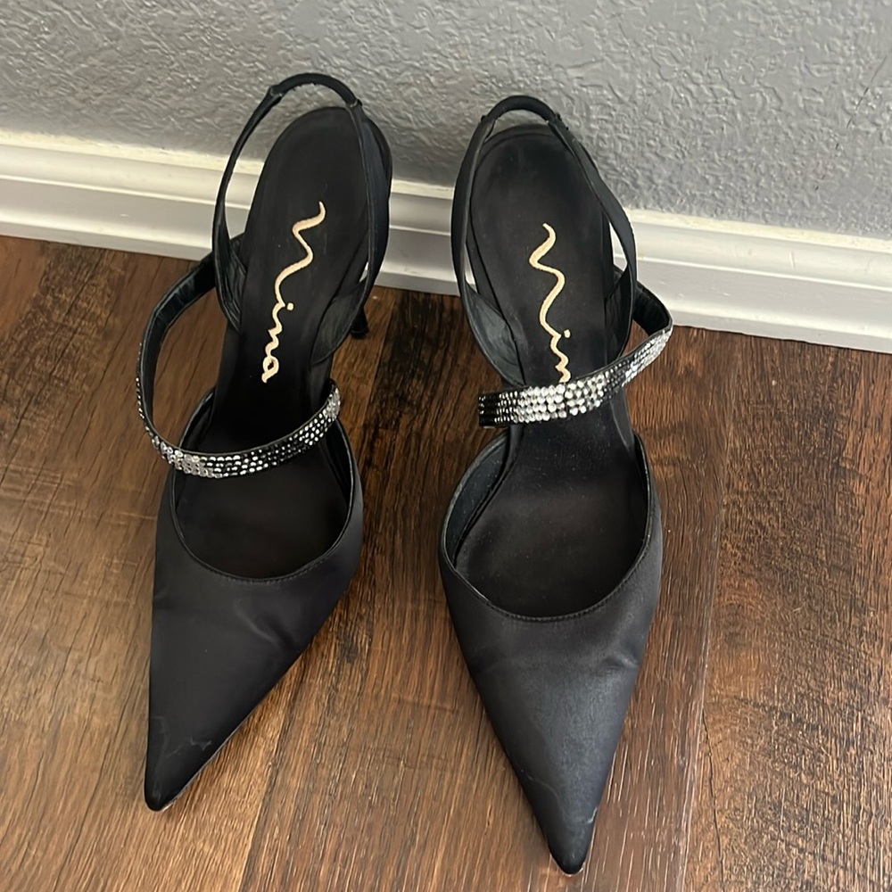 Black satin pumps